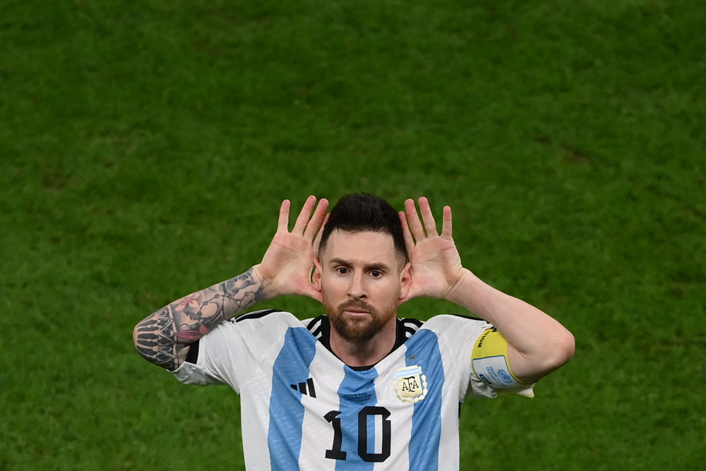 Lionel Messi celebrates after he scored his team’s second goal from the penalty spot. AFP