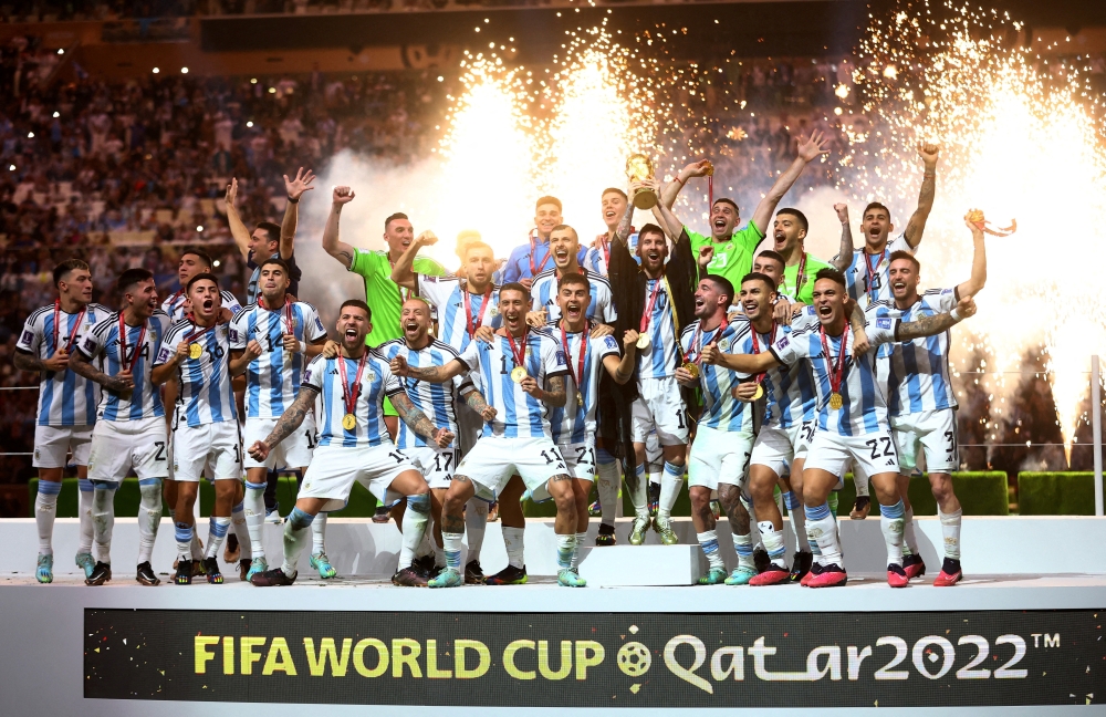 Argentina celebrate after winning the FIFA World Cup Qatar final match against France at Lusail Stadium on December 18, 2022. (REUTERS/Carl Recine)