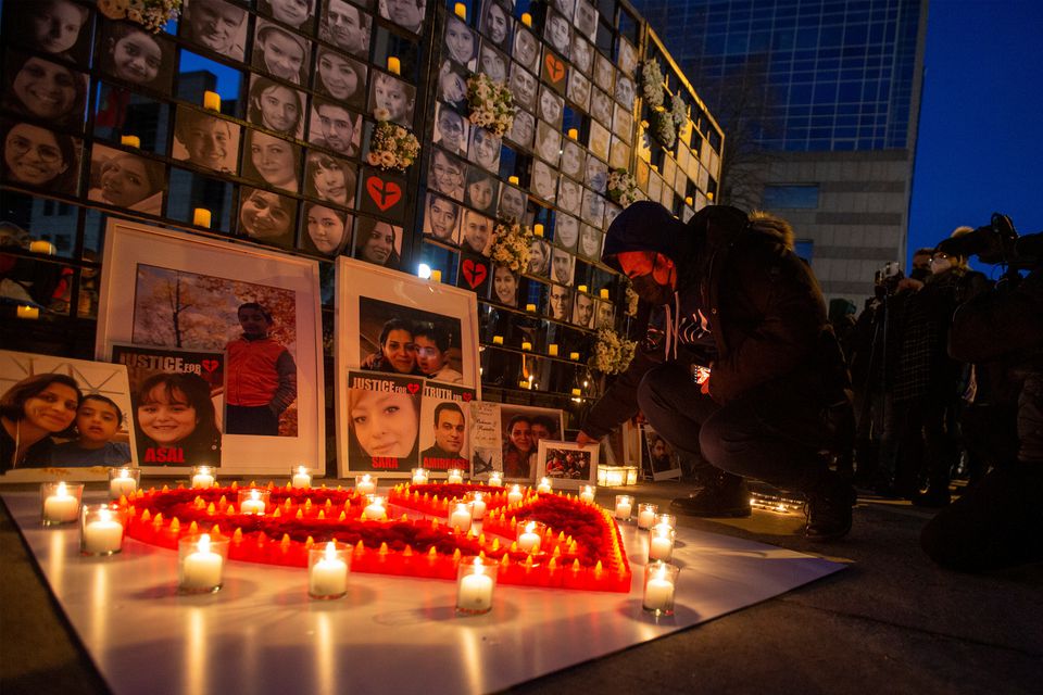 Mourners attend an outdoor vigil for the victims of Ukrainian passenger jet flight PS752 which was shot down two years ago over Iran, in Toronto, Ontario, Canada, on January 8, 2022. File Photo / Reuters
