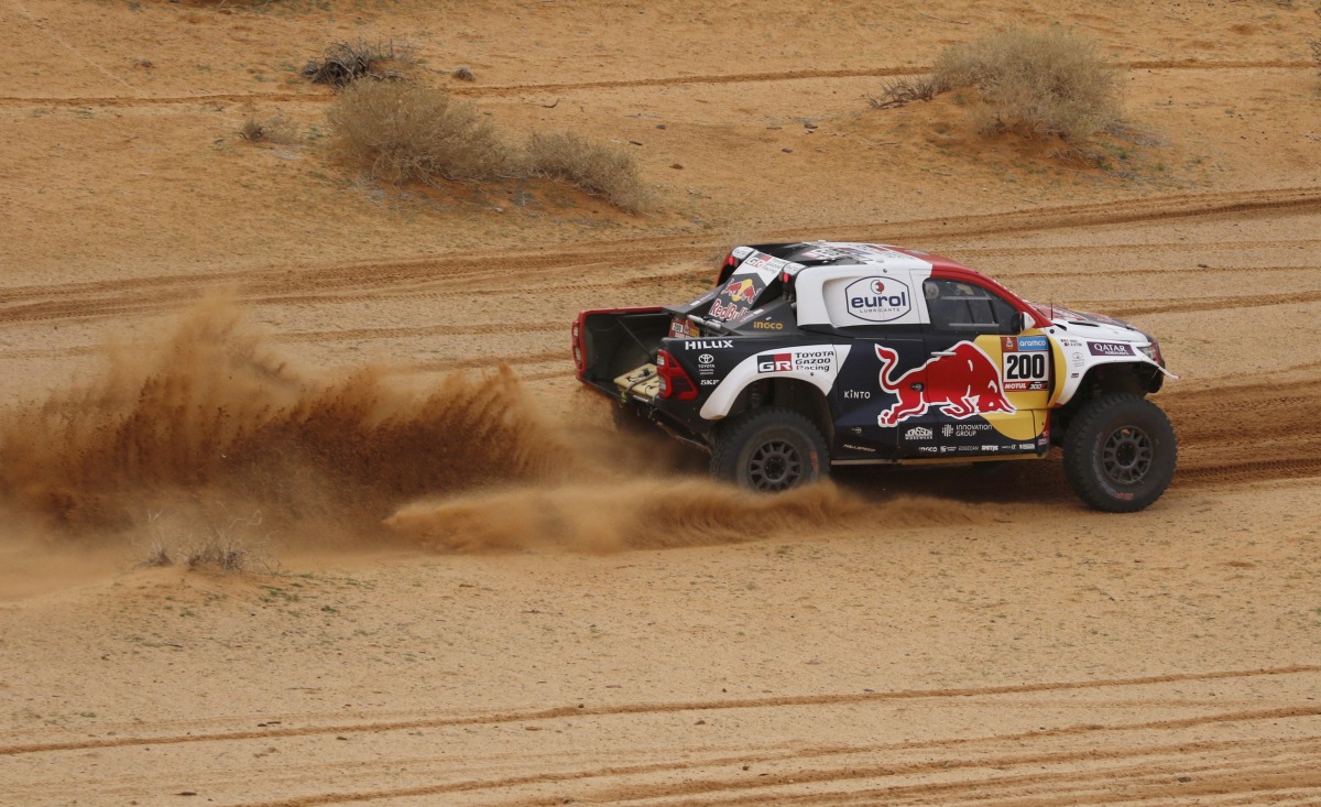 Nasser Al Attiyah and co-driver Mathiu Baumel in action during Stage 3 yesterday. 