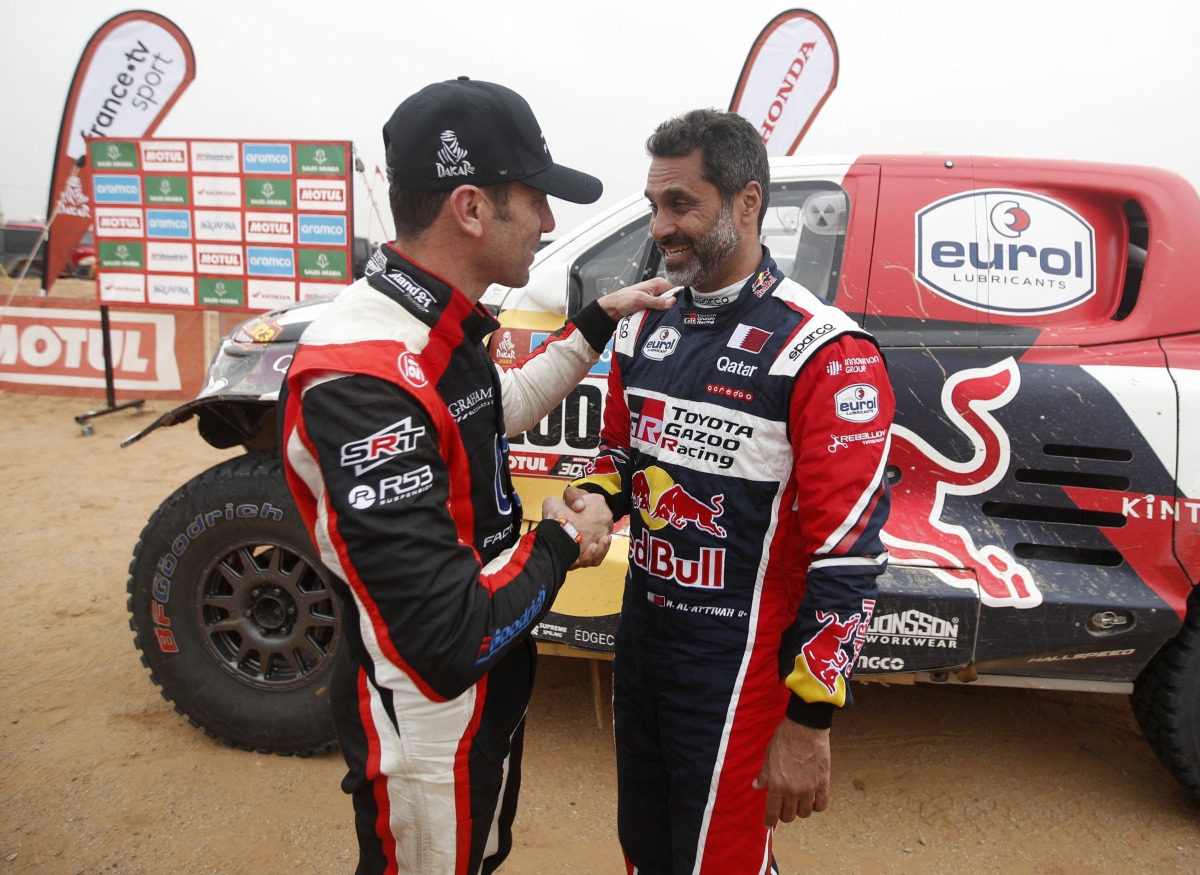 Toyota Gazoo Racing's Nasser Al Attiyah and co-driver Mathiu Baumel after the seventh stage, yesterday. REUTERS