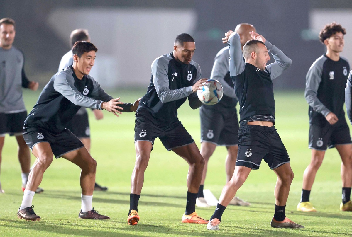 Al Sadd players during a training session, yesterday.