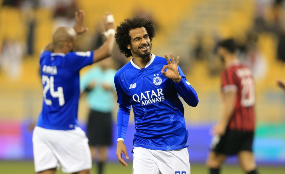 Akram Afif celebrates after scoring Al Sadd's second goal. 