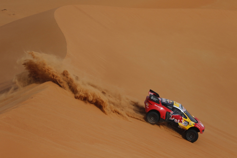 Bahrain Raid Xtreme's Sebastien Loeb and co-driver Fabian Lurquin in action during stage 12 REUTERS/Hamad I Mohammed