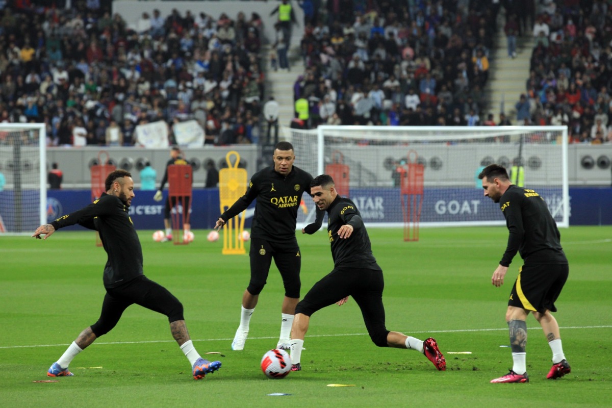 Lionel Messi with Kylian Mbappe, Achraf Hakimi and Neymar Jnr delight the fans during a workout session at the Khalifa International Stadium in Doha on Wednesday. Photo: Salim Matramkot / The Peninsula