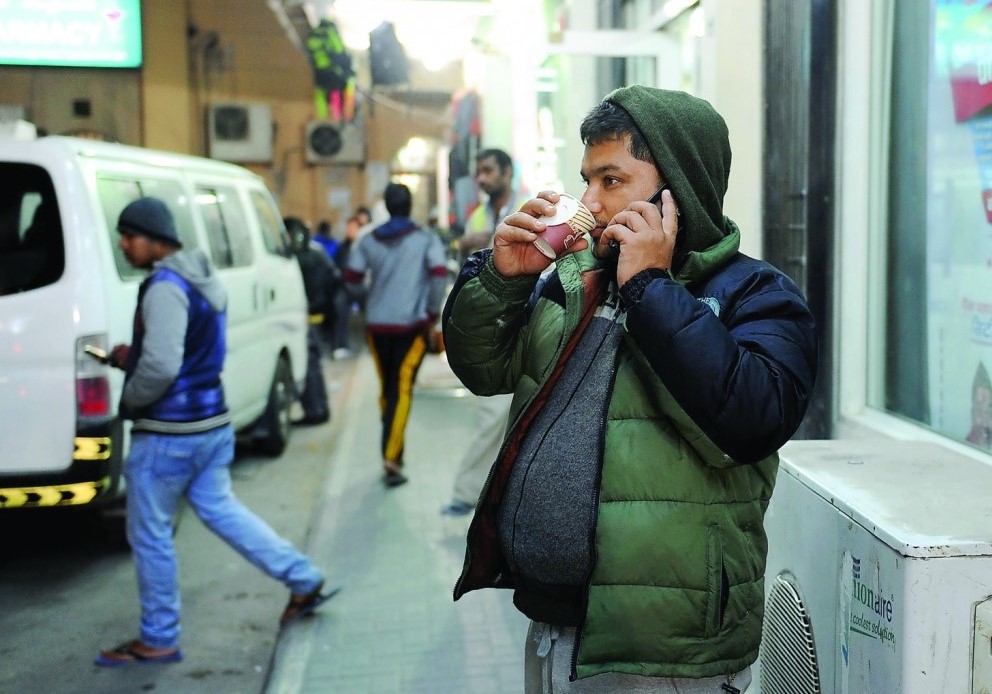 File Photo: As temperatures drop, a man sips hot tea at a cafe in Industrial Area to keep him warm. Pic: Salim Matramkot/The Peninsula