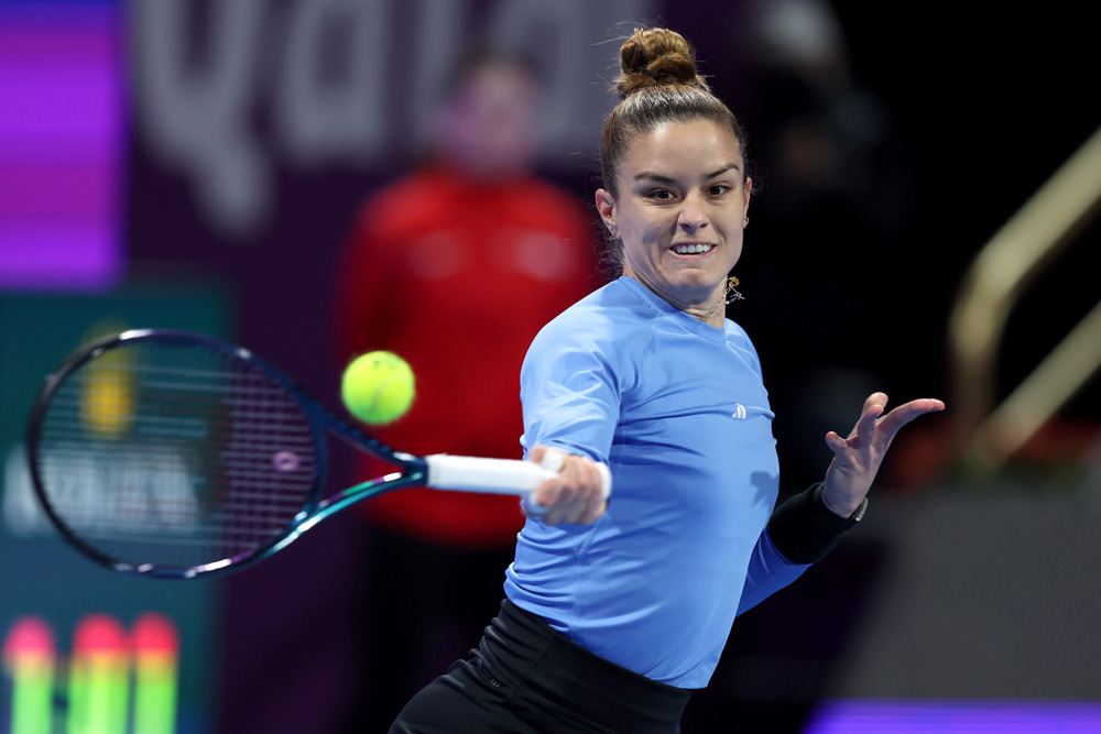 Maria Sakkari of Greece returns the ball to Caroline Garcia of France during their quarter-final match. Pictures: Mohamed Farag