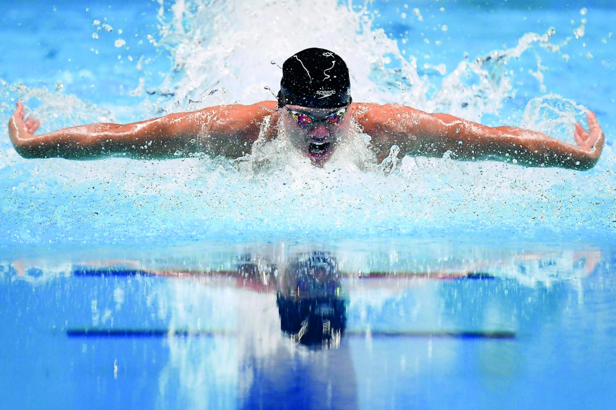 Singapore's Joseph Schooling competes in the final of the men’s 100m butterfly swimming event during the 2018 Asian Games in Jakarta on August 22, 2018. AFP / Jewel Samad

