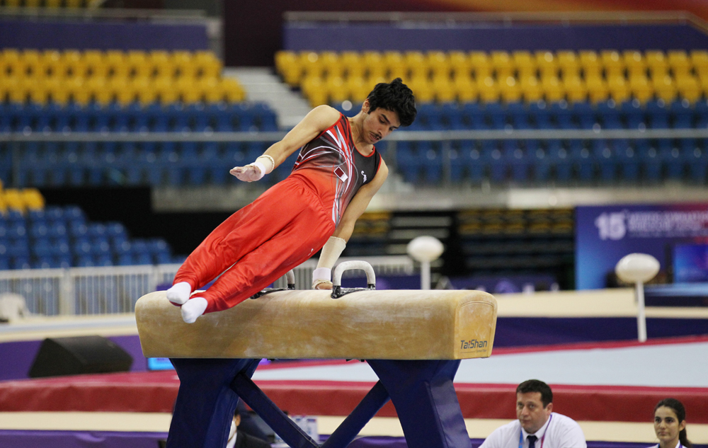 Rakan Al Harith of Qatar in action during the pommel horse round at Aspire Dome in Doha yesterday. Pic: Salim Matramkot/The Peninsula