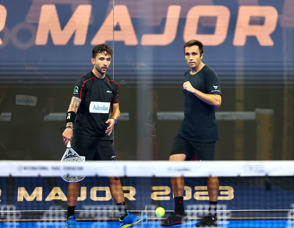 Carlos Daniel Gutierrez and Fernando Belasteguin celebrate after scoring a point during the semi-final.