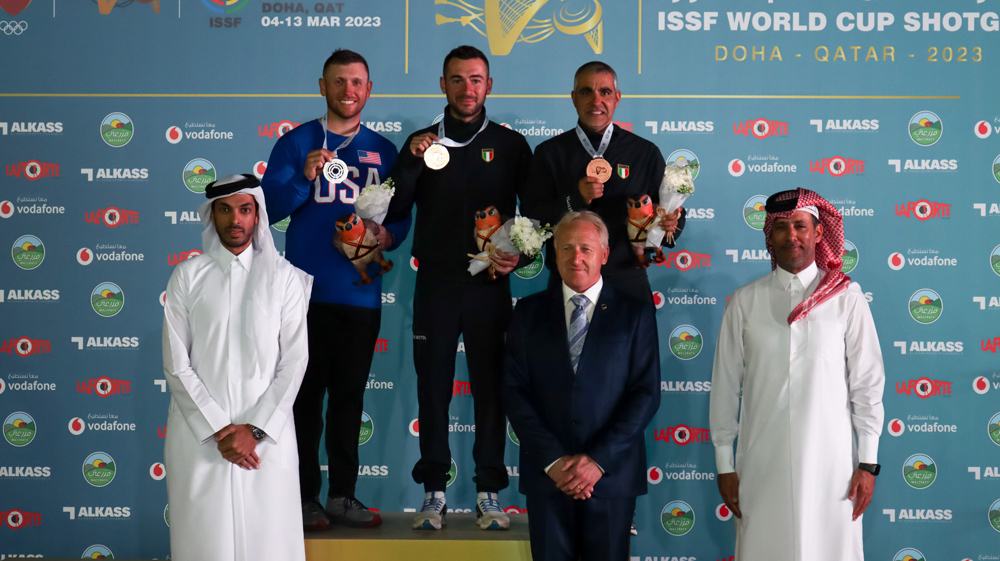 International Shooting Sport Federation (ISSF) Secretary-General Willi Grill, Qatar Shooting & Archery Association (QSAA) President Mishaal Ibrahim Al Nasr and QSAA Executive Director Jassim Shaheen Al Sulaiti with the podium winners of men's skeet. 