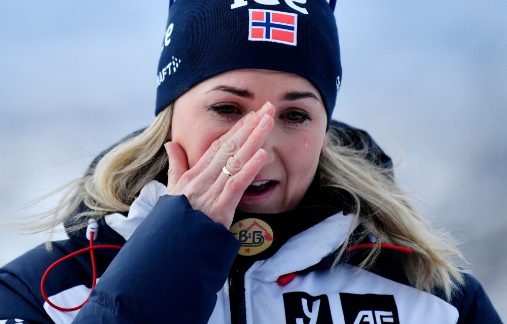 Marte Olsbu Roiseland wipes a tear during a press conference in Oslo , on March 14, 2023. Photo by Rodrigo Freitas and Rodrigo FREITAS / NTB / AFP