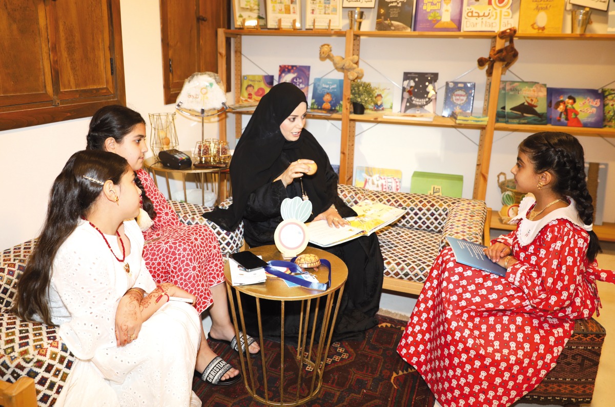 A storytelling session in one of the participating publishing houses at the 2nd Ramadan Book Fair at Darb Al Saai. PIC: Salim Matramkot /The Peninsula