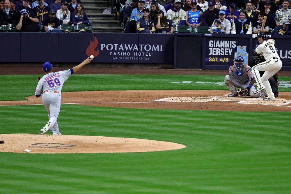 Brian Anderson #9 of the Milwaukee Brewers waits for a pitch from Carlos Carrasco #59 of the New York Mets during the second inning of Opening Day at American Family Field on April 03, 2023 in Milwaukee, Wisconsin. (Photo by Stacy Revere / GETTY IMAGES NORTH AMERICA / Getty Images via AFP)