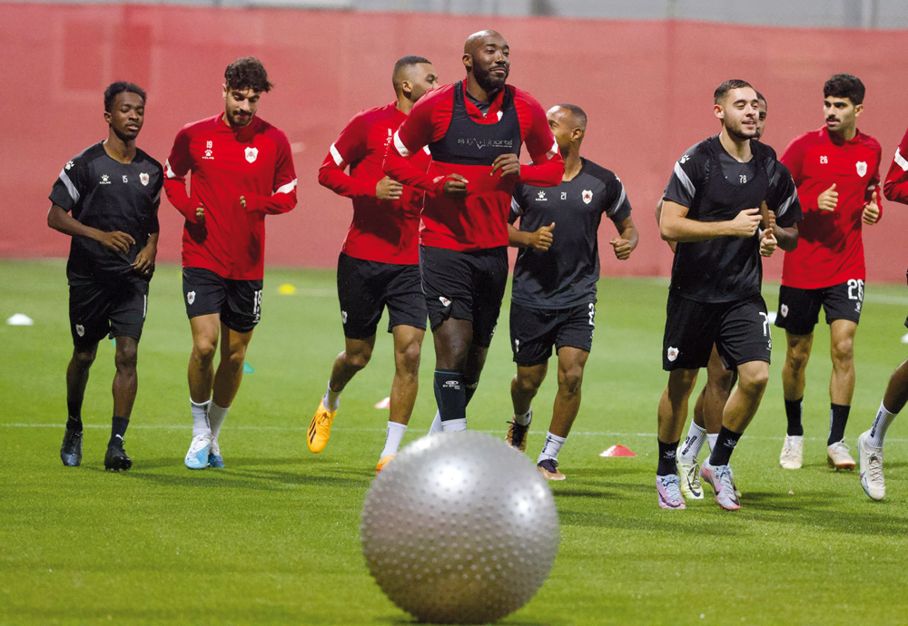 Al Rayyan players during a training session, yesterday.