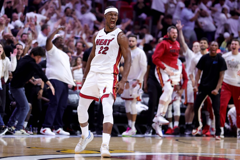 Retransmission with alternate crop.) Jimmy Butler #22 of the Miami Heat reacts during the fourth quarter against the Milwaukee Bucks in Game Four of the Eastern Conference First Round Playoffs at Kaseya Center on April 24, 2023 in Miami, Florida.  Megan Briggs/AFP 