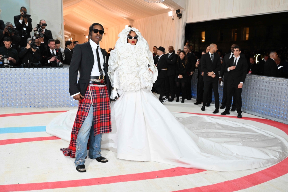 US rapper A$AP Rocky (L) and Barbadian singer/actress Rihanna arrive for the 2023 Met Gala. (Photo by Angela Weiss / AFP)