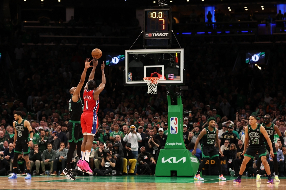 James Harden #1 of the Philadelphia 76ers hits the game winning three point shot past Al Horford #42 of the Boston Celtics during the fourth quarter for the 76ers to defeat the Celtics 119-115 in game one of the Eastern Conference Second Round Playoffs at TD Garden on May 01, 2023 in Boston, Massachusetts. (Photo by Maddie Meyer / GETTY IMAGES NORTH AMERICA / Getty Images via AFP)
