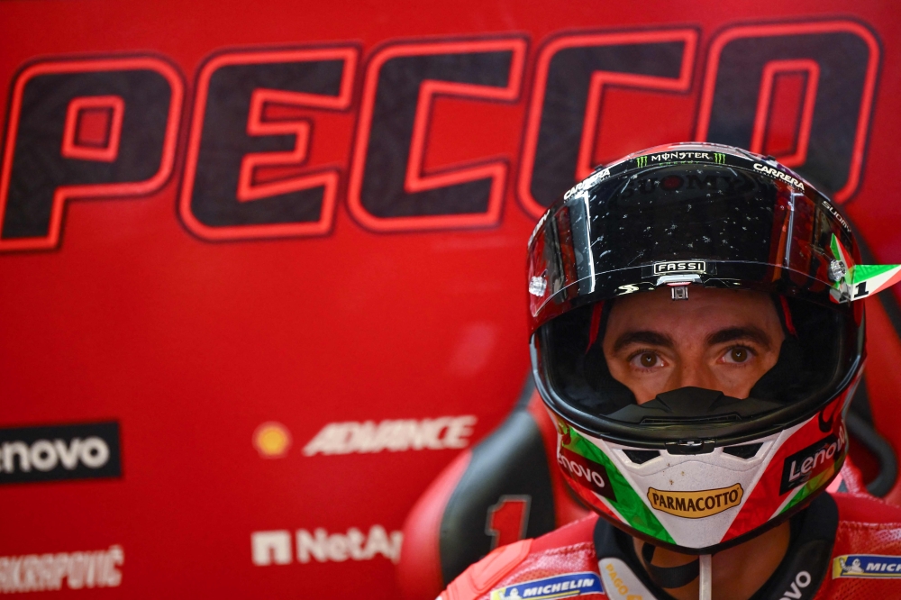 Ducati Italian rider Francesco Bagnaia looks on prior to the practice session ahead of the the Italian MotoGP race at Mugello Circuit in Mugello, on June 10, 2023. (Photo by Filippo Monteforte / AFP)