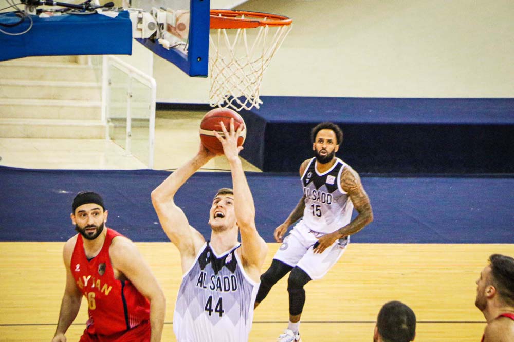 Al Sadd's Alen Hadzibegovic prepares to shoot during the Amir Cup basketball tournament semi-final against Al Rayyan at Al Gharafa Sports Complex yesterday.