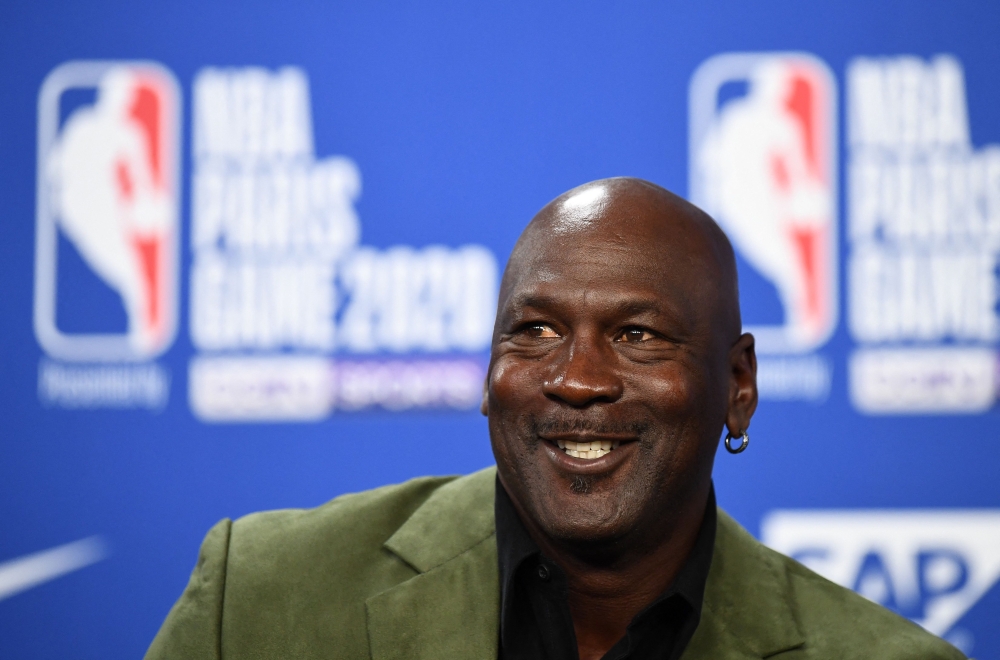 Former NBA star and owner of Charlotte Hornets team Michael Jordan looks on as he addresses a press conference ahead of the NBA basketball match between Milwakuee Bucks and Charlotte Hornets at The AccorHotels Arena in Paris on January 24, 2020. (Photo by Franck Fife / AFP)