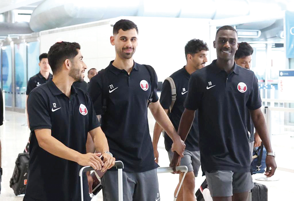 Qatar coach Carlos Queiroz walks as Al Annabi reach Houston. RIGHT: Striker Almoez Ali (right) along with team-mates at the airport.   