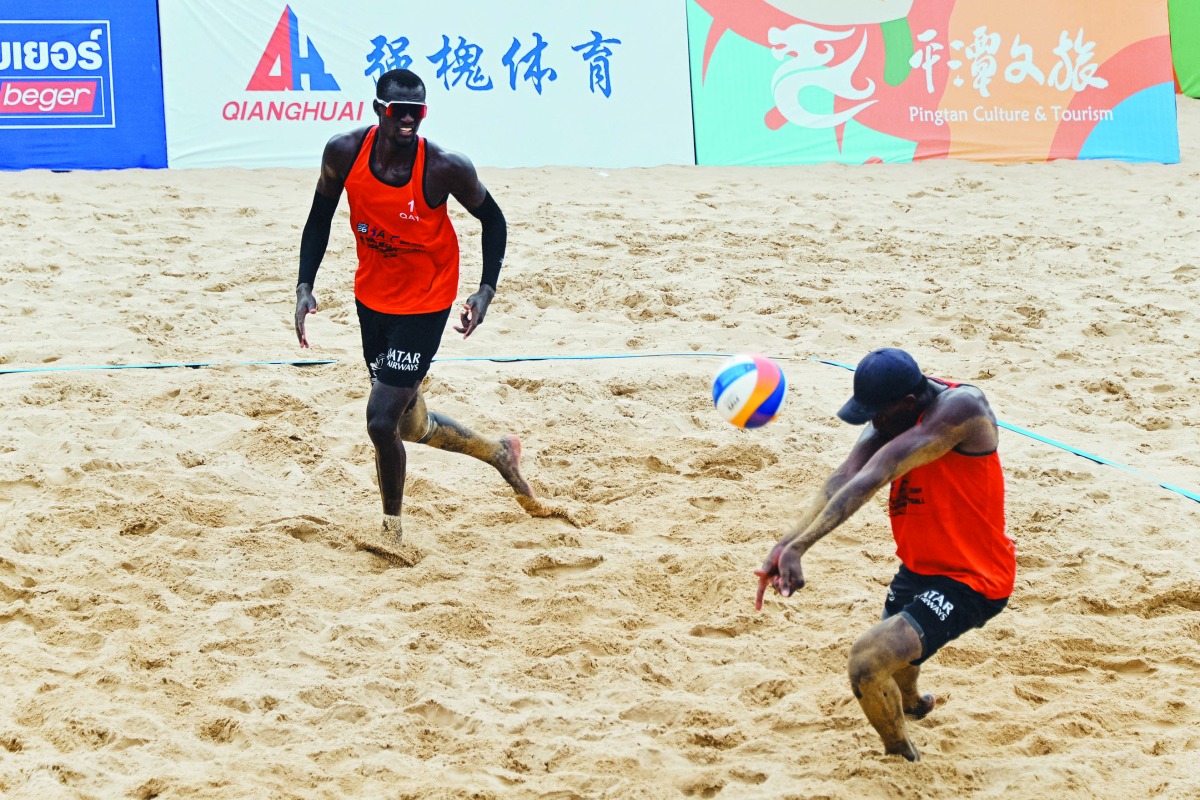 Qatar's Cherif Younousse and Ahmed Tijan in action against Gurin Kirill and Aldash Nurdos of Kazakhstan.