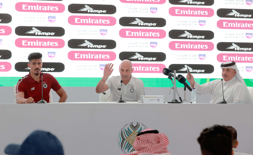 Al Sadd's coach Bruno Miguel (centre) speaks during a press conference yesterday. Al Sadd's striker Baghdad Bounedjah (left) is also present.  