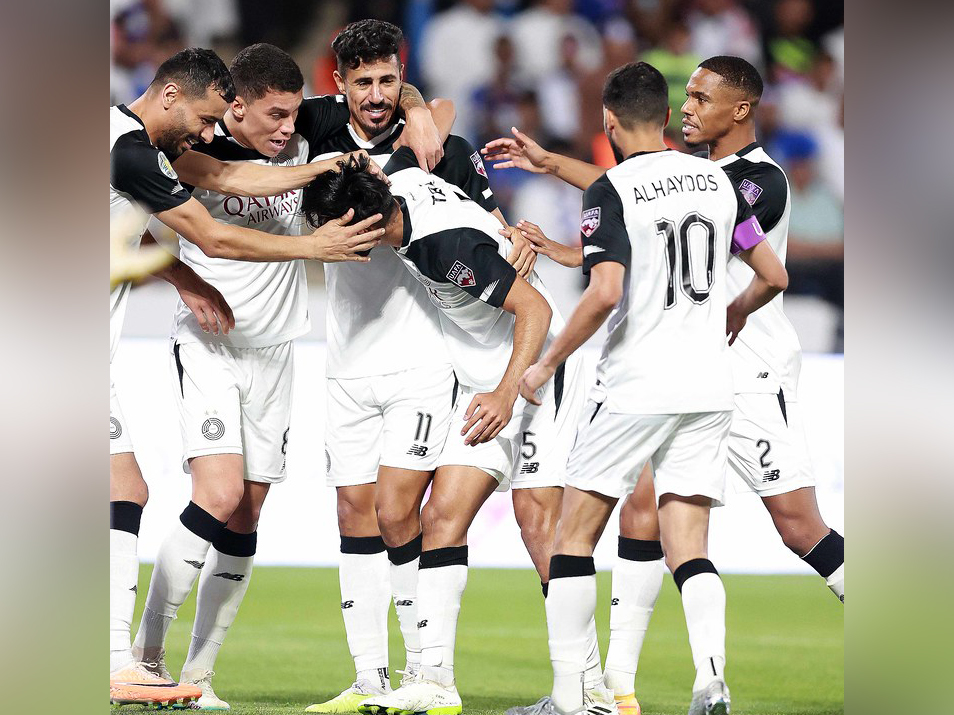 Al Sadd players celebrate during the match on Sunday.