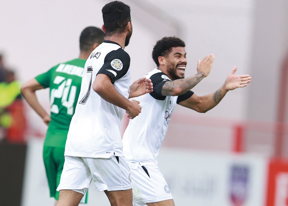 Al Sadd's Paulo Otavio celebrates after scoring the winning goal.