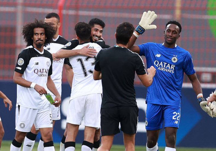 Al Sadd players celebrate after defeating Al Ahli Tripoli on Wednesday.