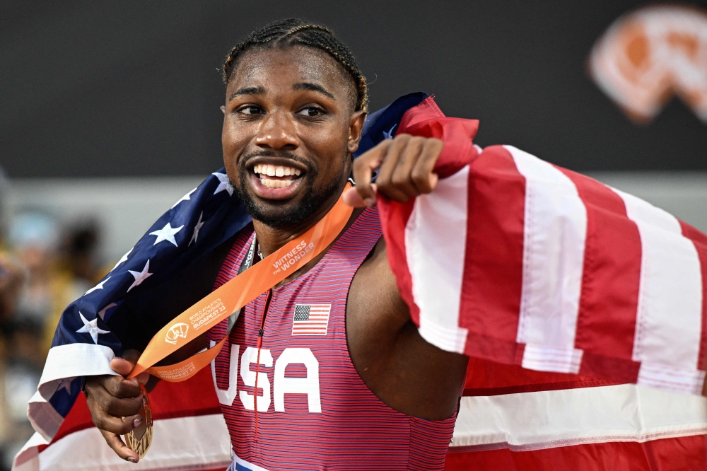 USA's Noah Lyles celebrates winning the men's 100m final during the World Athletics Championships at the National Athletics Centre in Budapest on August 20, 2023. Photo by Kirill KUDRYAVTSEV / AFP