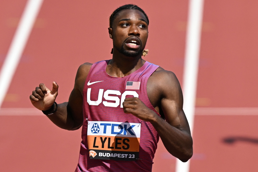 USA's Noah Lyles reacts after the men's 200m heats during the World Athletics Championships at the National Athletics Centre in Budapest on August 23, 2023. Photo by Attila KISBENEDEK / AFP