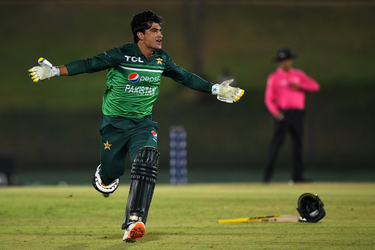 Pakistan's Naseem Shah celebrates after Pakistan won by 1 wicket during the second one-day international (ODI) cricket match between Pakistan and Afghanistan at the Mahinda Rajapaksa International Cricket Stadium in Hambantota on August 24, 2023. (Photo by Ishara S. Kodikara / AFP)