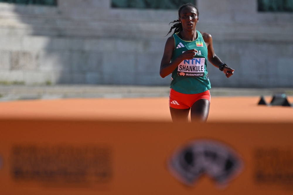 Ethiopia's Amane Beriso Shankule races to the finish line in the women's marathon final during the World Athletics Championships in Budapest on August 26, 2023. (Photo by Andrej Isakovic / AFP)