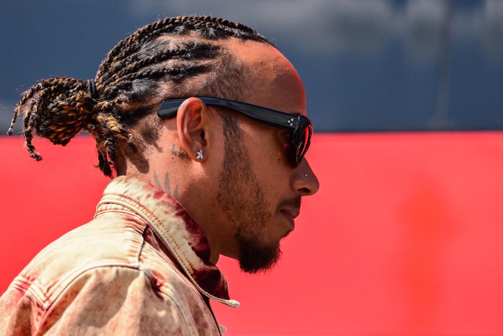 Mercedes' British driver Lewis Hamilton looks on prior to the first practice session, ahead of the Italian Formula One Grand Prix at Autodromo Nazionale Monza circuit, in Monza on September 1, 2023. Photo by Ben Stansall / AFP