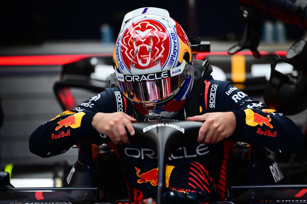 Red Bull Racing's Dutch driver Max Verstappen sits in his car prior to the start of first practice session, ahead of the Italian Formula One Grand Prix at Autodromo Nazionale Monza circuit, in Monza on September 1, 2023. Photo by Marco BERTORELLO / AFP