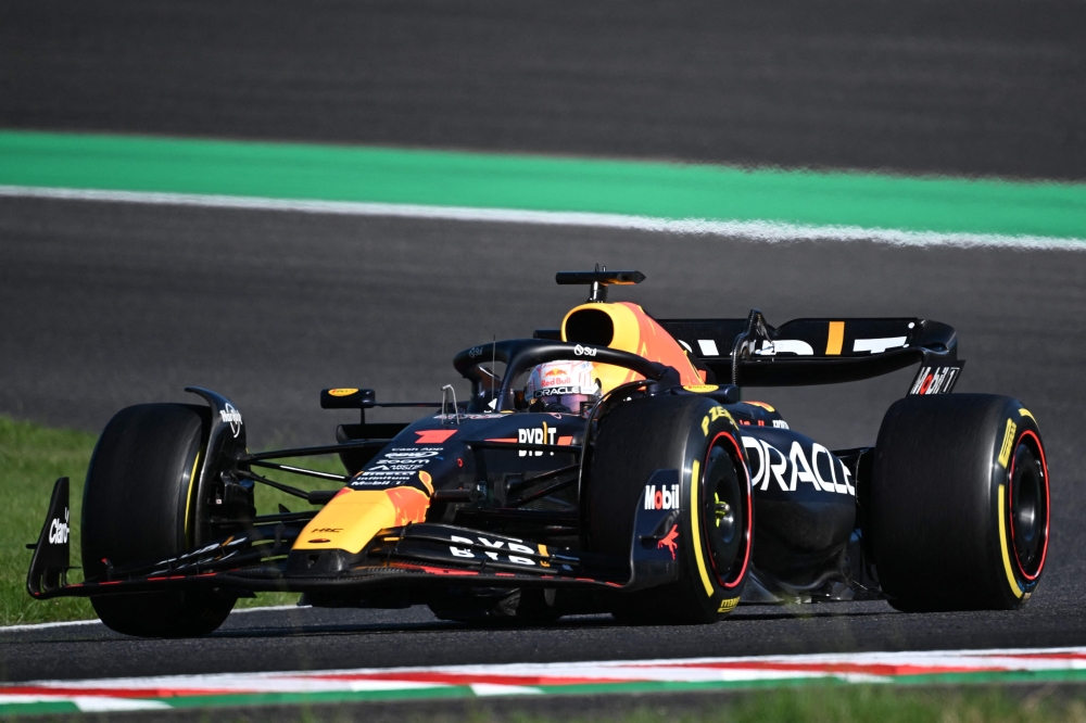 Red Bull Racing's Dutch driver Max Verstappen drives during the Formula One Japanese Grand Prix at the Suzuka circuit, Mie prefecture on September 24, 2023. (Photo by Peter PARKS / AFP)