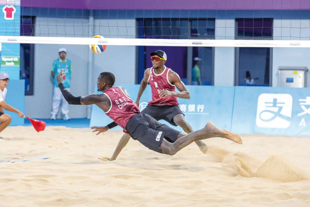 Qatar's Cherif Younousse and Ahmed Tijan in action during their men’s beach volleyball semi-final match against Kazakhstan’s Sergey Bogatu and Dmitriy Yakovlev, yesterday.