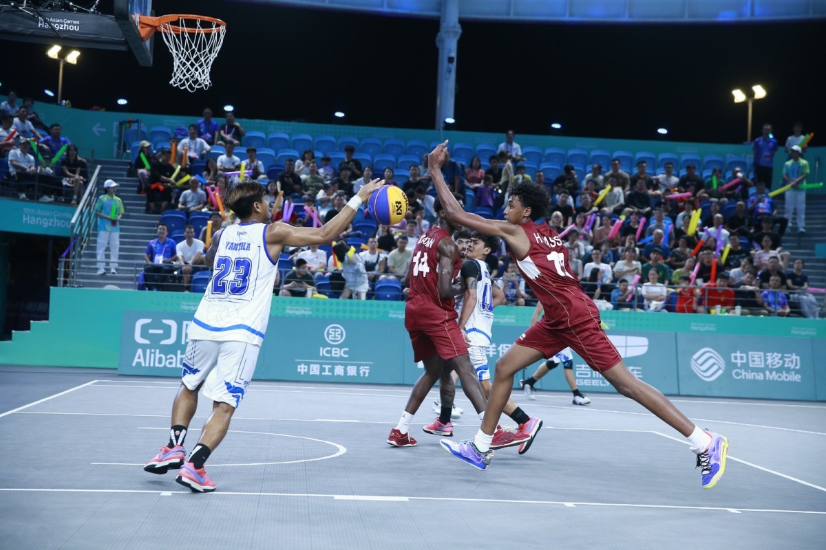 Action during the 3x3 basketball Pool D match between Qatar and Cambodia.