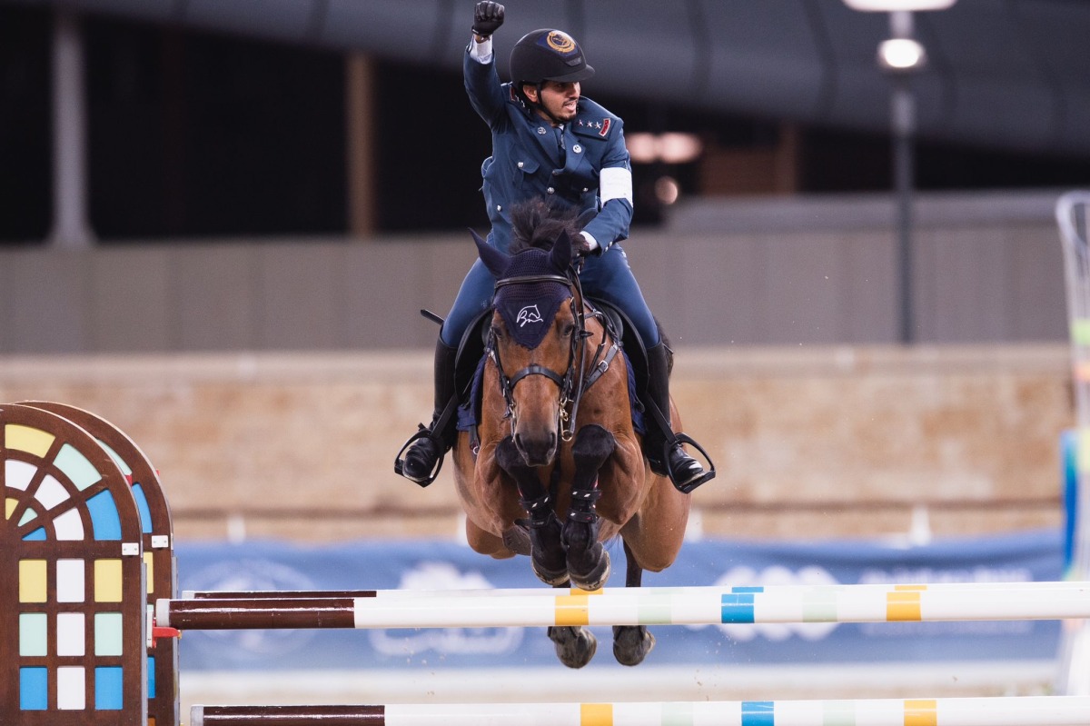 Qatari rider Faleh Suwead Al Ajami astride Crispo celebrates after winning final round of last season's Hathab Series, in this file photo.