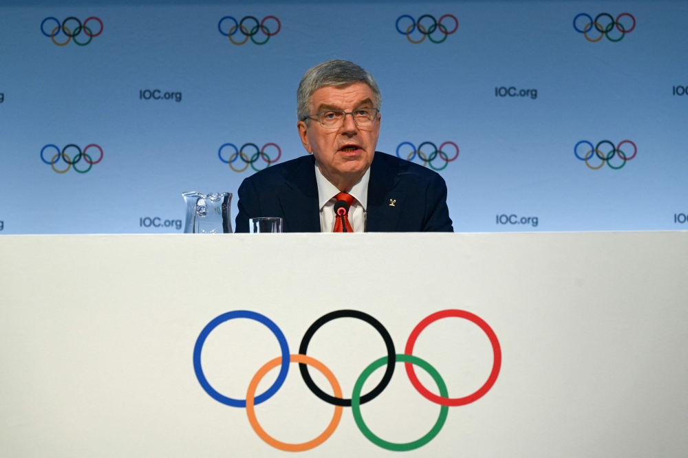 International Olympic Committee (IOC) President Thomas Bach speaks during a press conference ahead of the upcoming 141st IOC session in Mumbai on October 13, 2023. (Photo by INDRANIL MUKHERJEE / AFP)