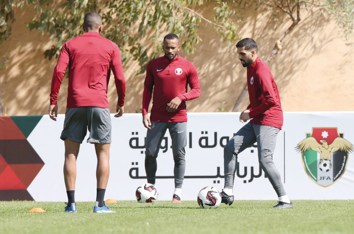 Qatar captain Hassan Al Haydos (right) trains with teammates ahead of the Jordan International Quad Championship final against Iran today. 

