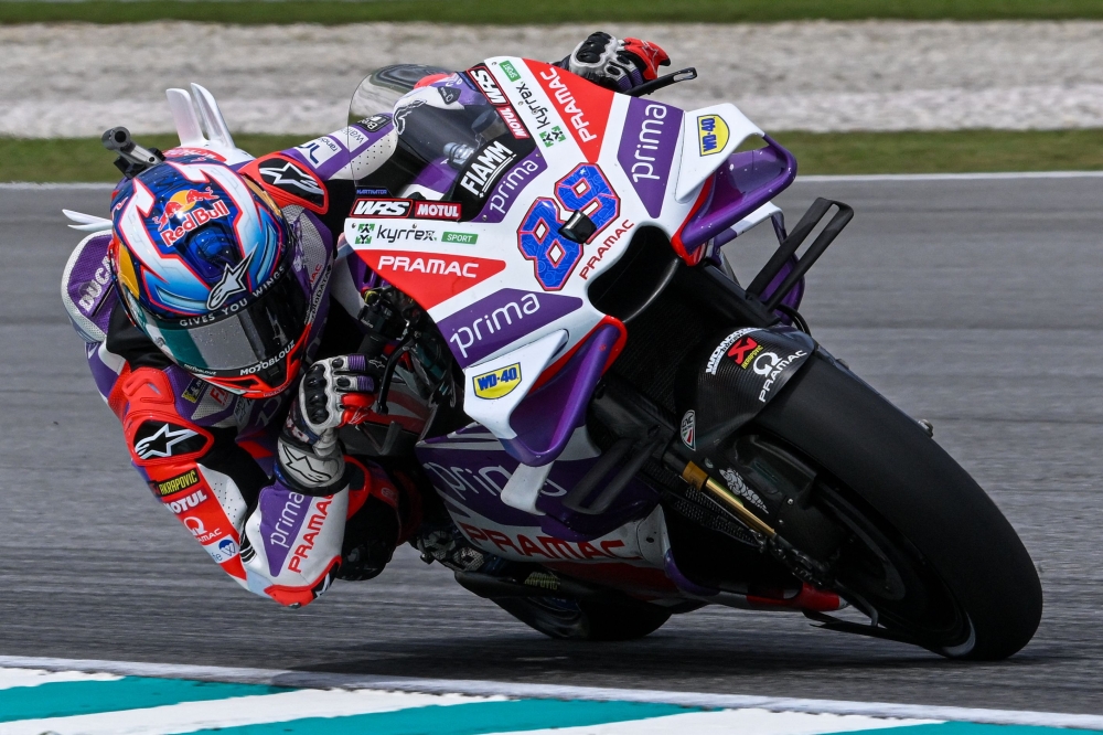 Prima Pramac's Spanish rider Jorge Martin steers his bike during the first practice session of the MotoGP Malaysian Grand Prix at the Sepang International Circuit in Sepang on November 10, 2023. (Photo by Mohd RASFAN / AFP)