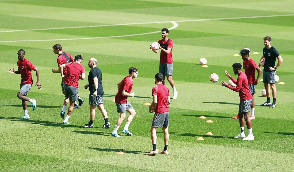 Qatar players in action during a training session, yesterday. PICTURES: RAJAN VADAKKEMURIYIL