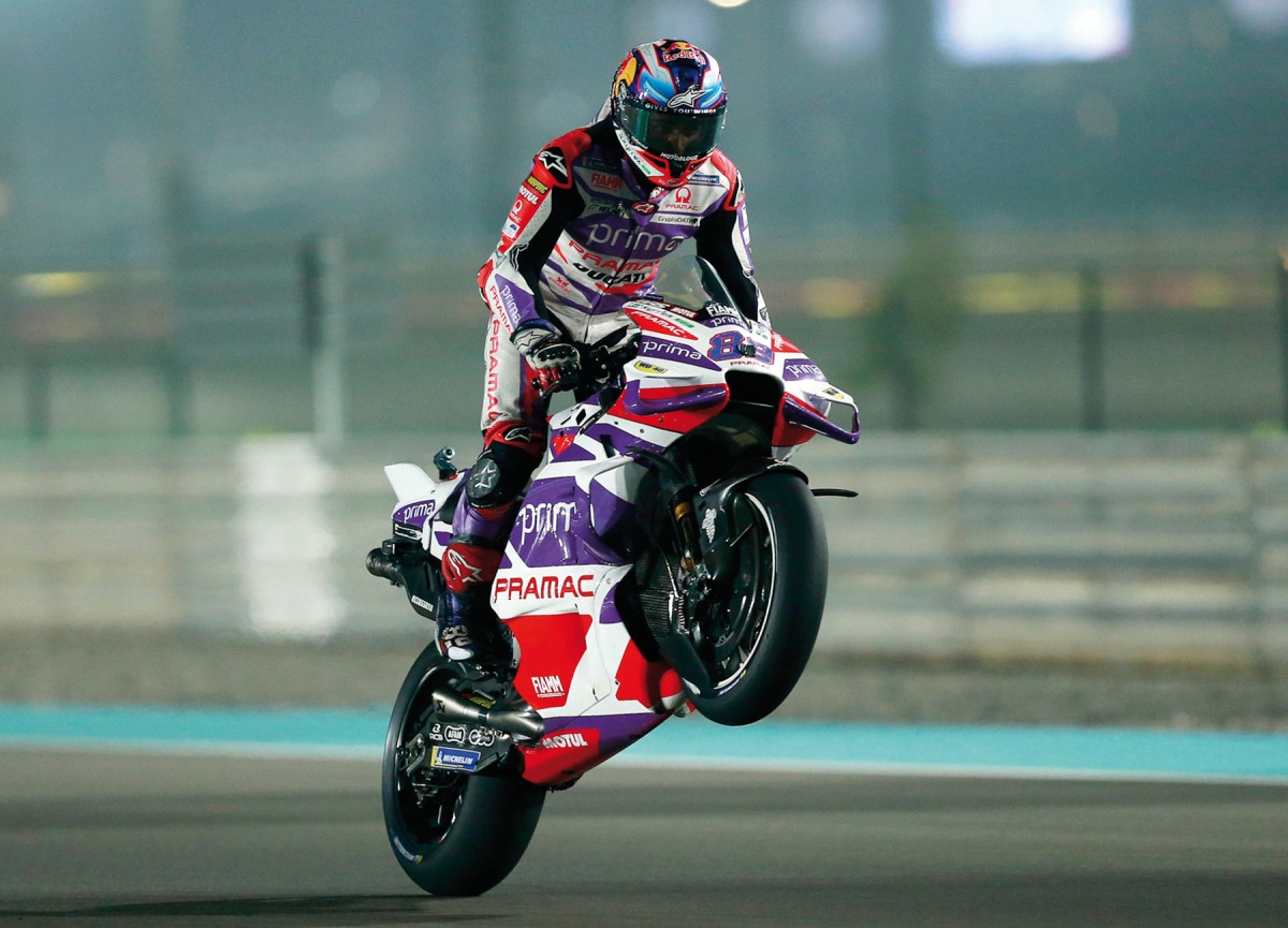 Prima Pramac Racing's Spanish rider Jorge Martin does a wheelie as he wins the sprint race ahead of the Qatar Airways Grand Prix of Qatar at the Lusail International Circuit, yesterday. Pictures: Rajan Vadakkemuriyil