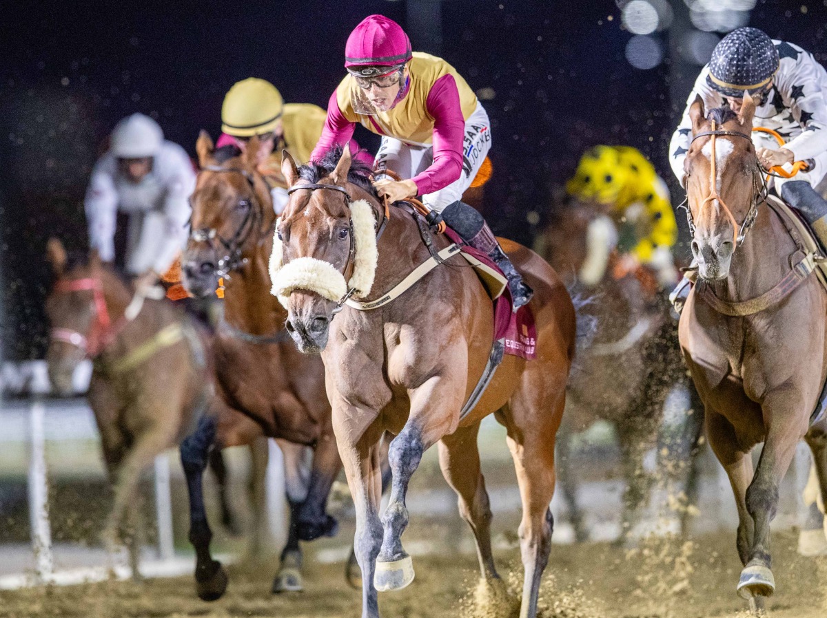 Jockey Soufiane Saadi (centre) guides Ernest Aldrich to Brooq Cup victory during the 11th Al Rayyan Race Meeting. Pic: Juhaim/QREC