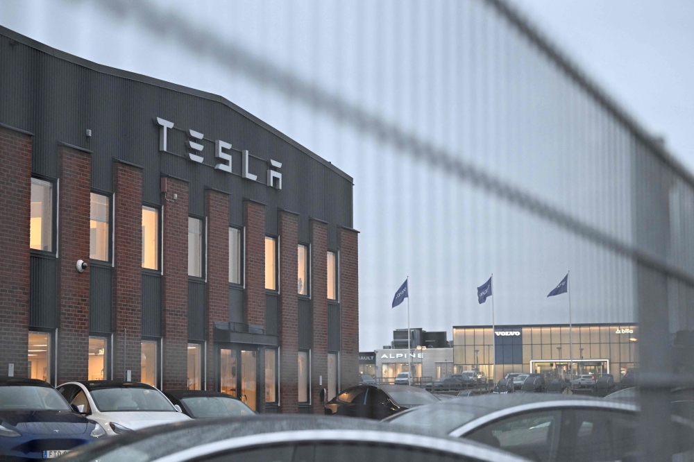 A photograph taken on October 27, 2023 shows a view of the electric car company Tesla's Service Center in Segeltorp, south of Stockholm. Photo by Jessica Gow/TT / TT NEWS AGENCY / AFP

