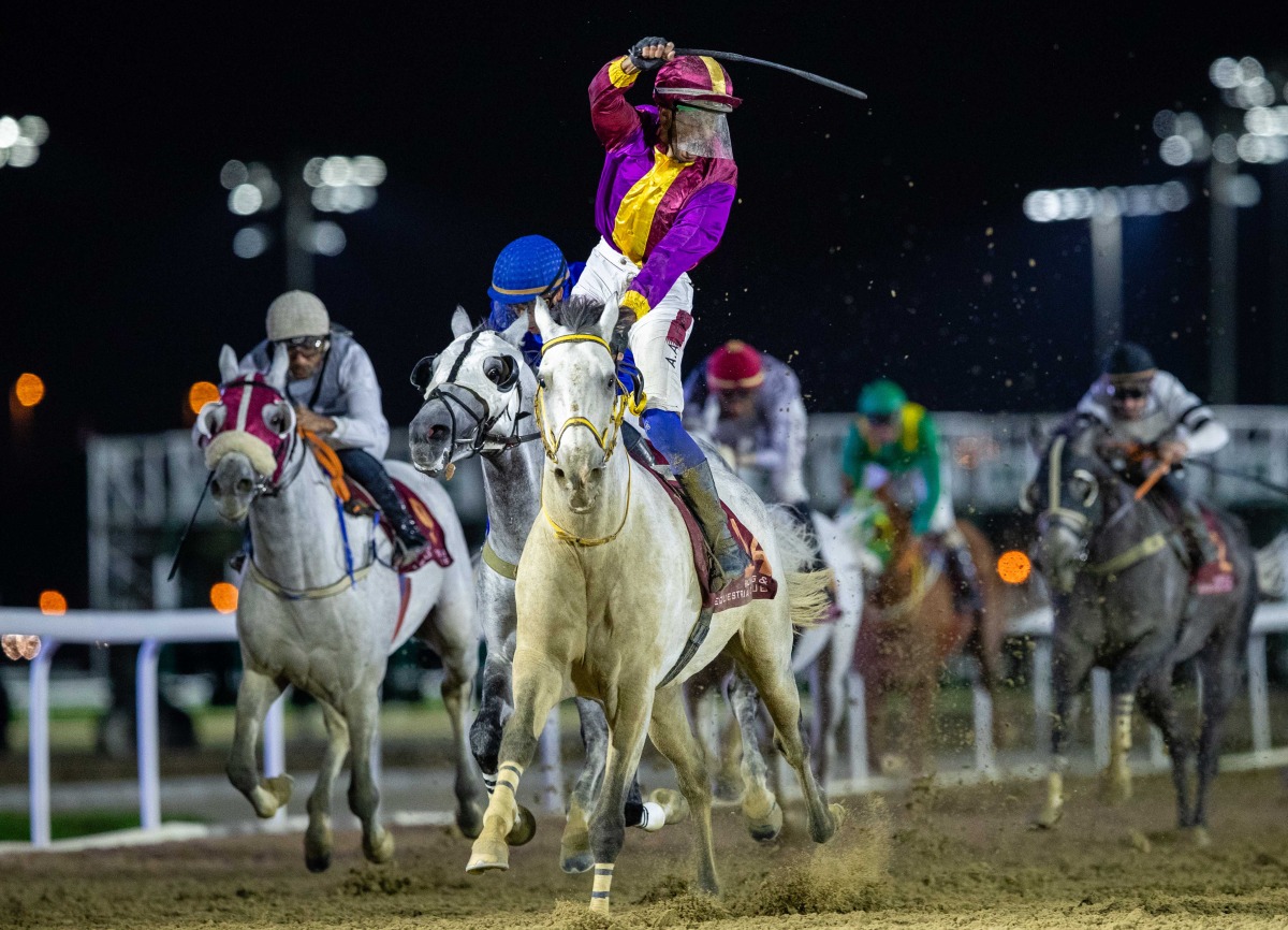 Abdulla Rashid Al Hajri celebrates after steering Safi Al Zaman to victory. PICS: Juhaim/QREC  