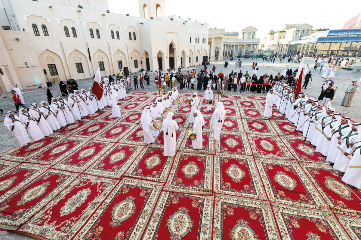 A troupe performs Ardha, Qatar's traditional sword dance, at Katara. 